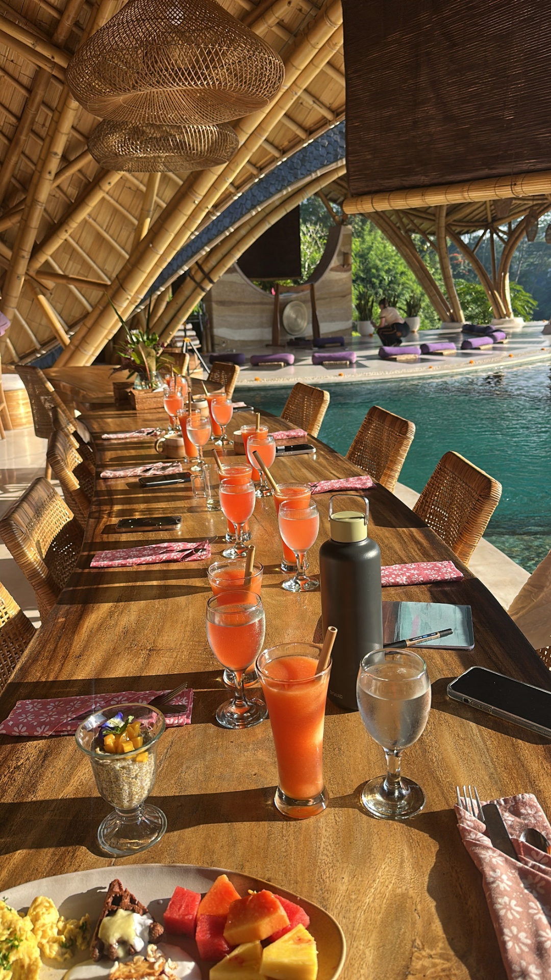 Long communal breakfast table by the pool